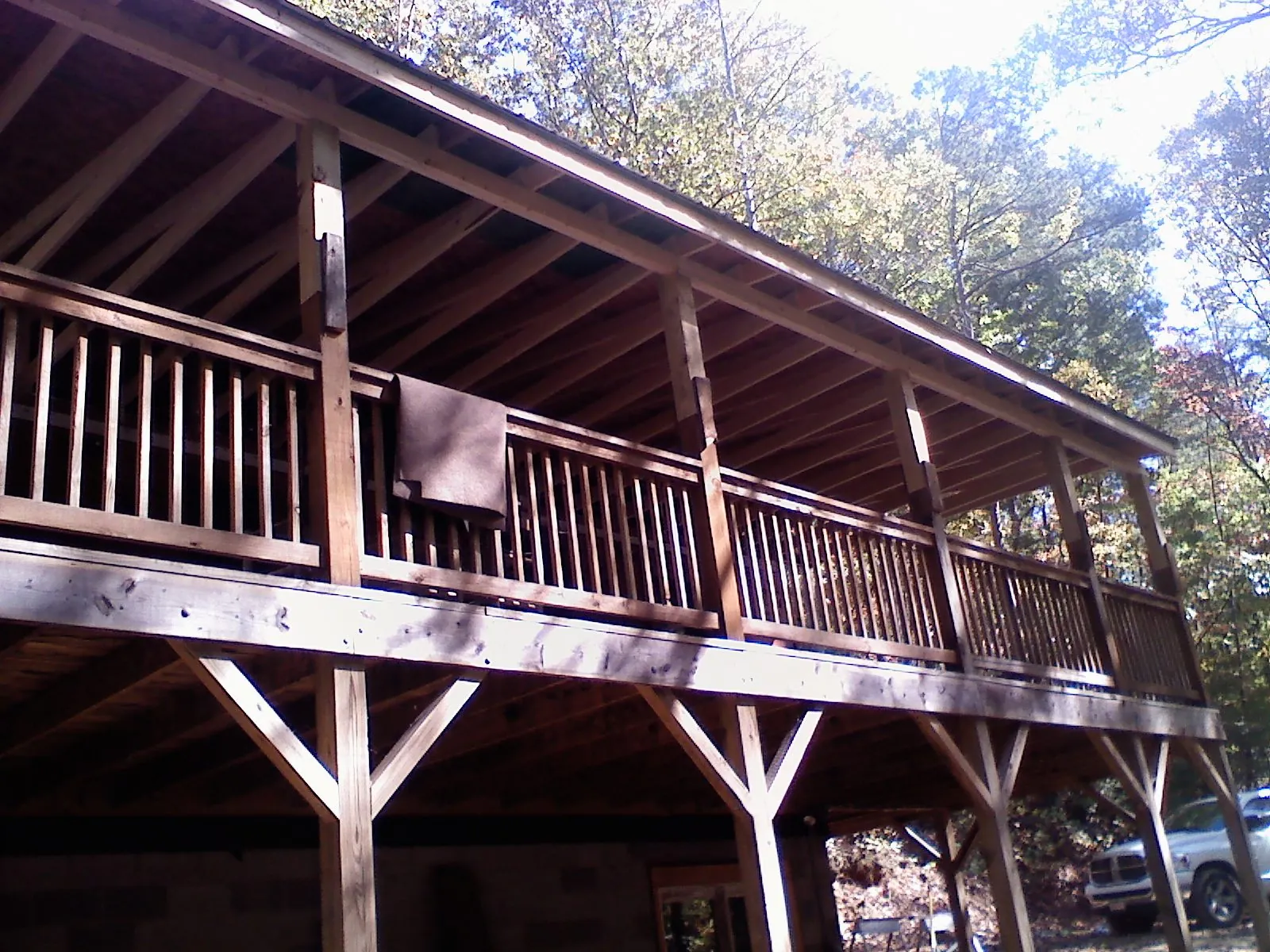 Timber framing under a new elevated porch and deck — Roof Leak Repair in Bradyville by Roofing Brothers